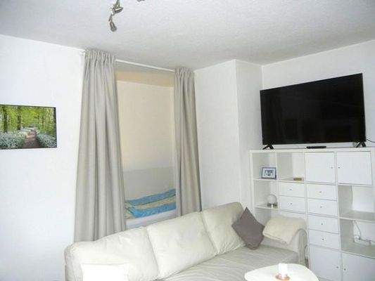 Wohnzimmer mit Schlafkammer