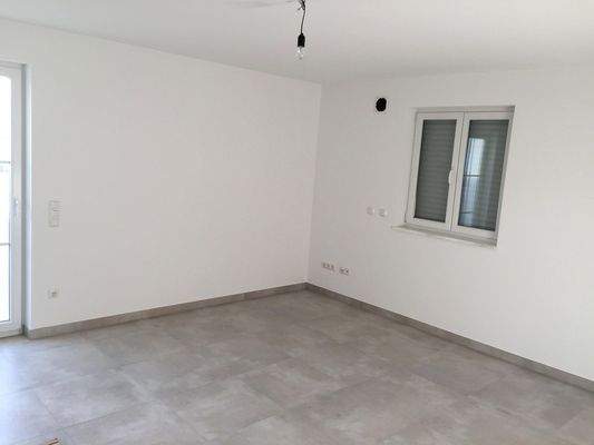 Schlafzimmer mit Balkonzugang