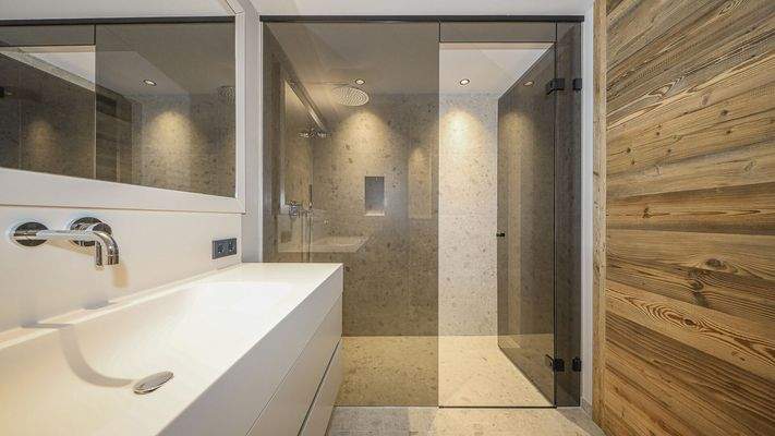 KITZIMMO-Luxuriöse Gartenwohnung mit eigenem Wellnessbereich - Immobilien Brixen.