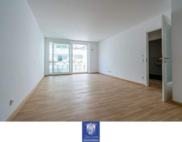 Charmante Neubauwohnung mit hofseitigem Balkon, Fußbodenheizung, EBK, Gäste-WC! - Foto 1