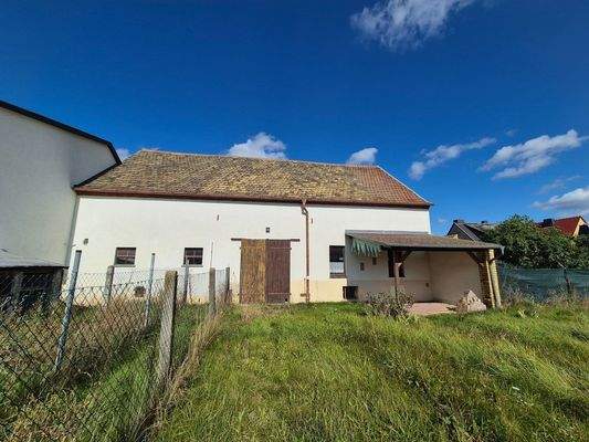 6. Gartenansicht Scheune mit Terrasse