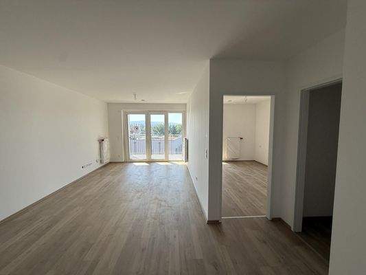 Haus_1_Top_14_Wohnbereich_und_Zimmer