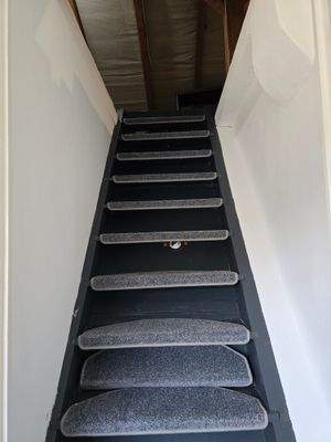 Treppe zum Dachspeicher