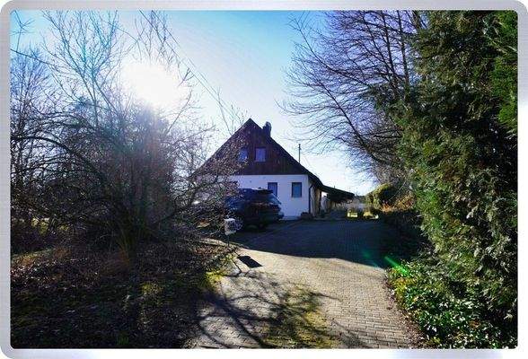 Haus mit Stellplätzen