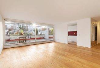 Wohn-/Essbereich mit Balkonzugang