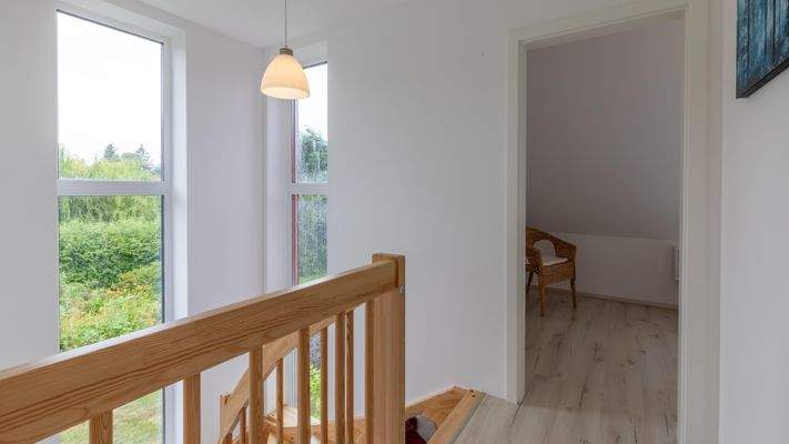 A1 Geschosstreppe und Flur im Obergeschoss