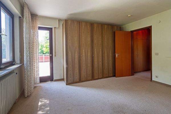 Schlafzimmer 1 EG mit Zugang zur Westterrasse