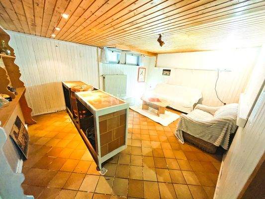 Mögliches Wohnzimmer mit Öffnung zur lichtdurchfluteten KÜch