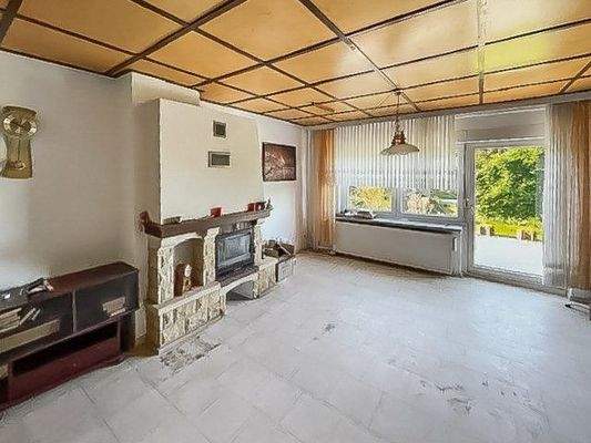 Wohnzimmer mit Kamin