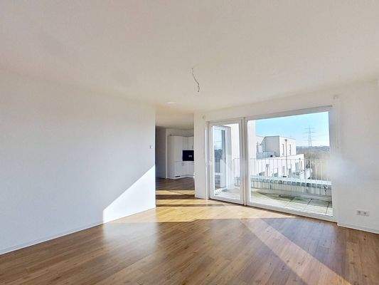 Ansicht I: Wohn- und Esszimmer mit offenem Küchenbereich