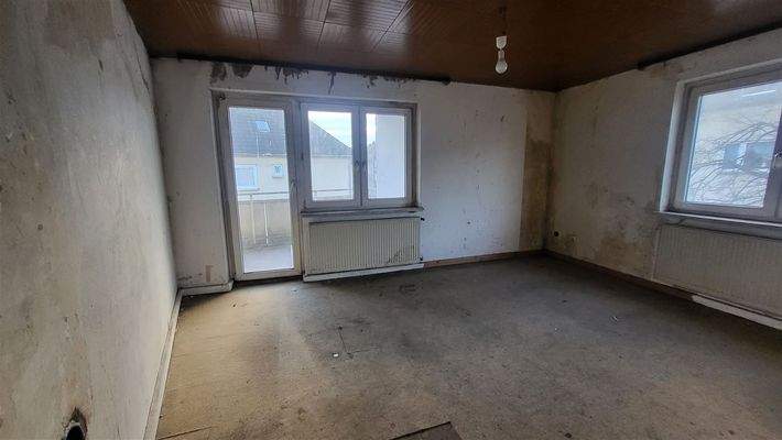 Wohnzimmer mit Balkon