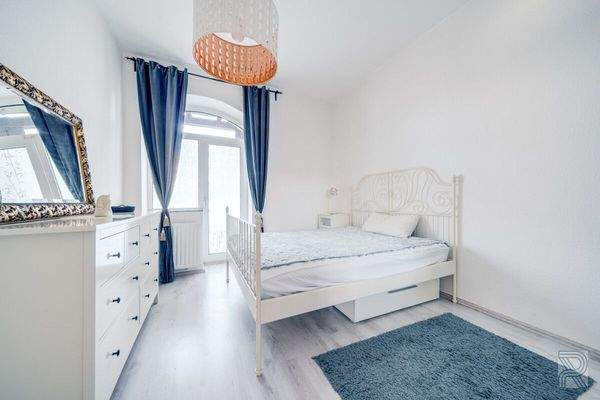 Schlafzimmer mit Balkon