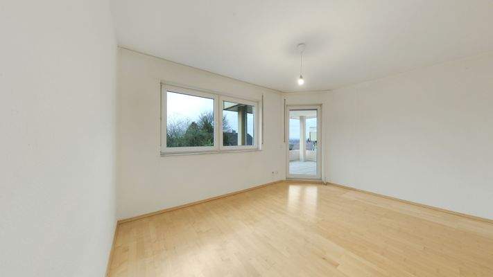 Schlafzimmer mit Balkonzugang