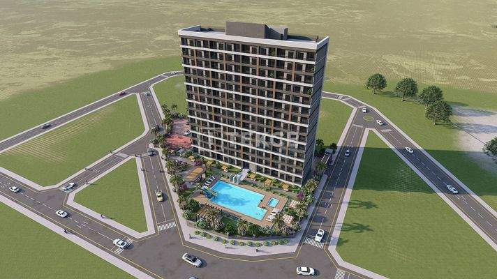 New Apartments in Mersin with a Pool and Modern Landscaping