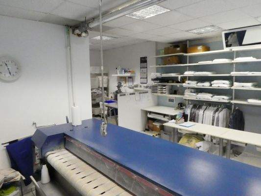 Textilreinigung und Heißmangel