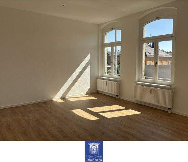 Zentral gelegene Wohnung mit Balkon, Bad mit Wanne und Wohnküche! - Foto 1
