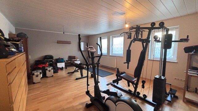Das Wohnzimmer/Fitness im KG