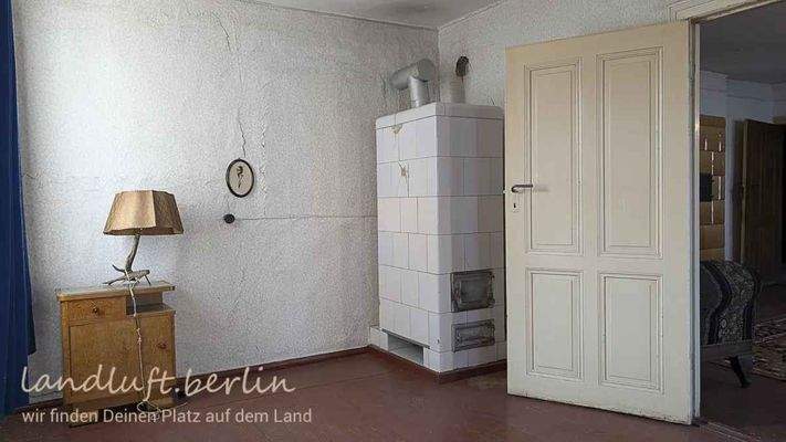 Lehnschulzenhaus OG, Raum 13 mit Ofen.jpg