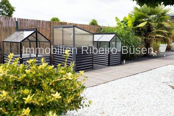 Gewächshäuser in stimmigem Design