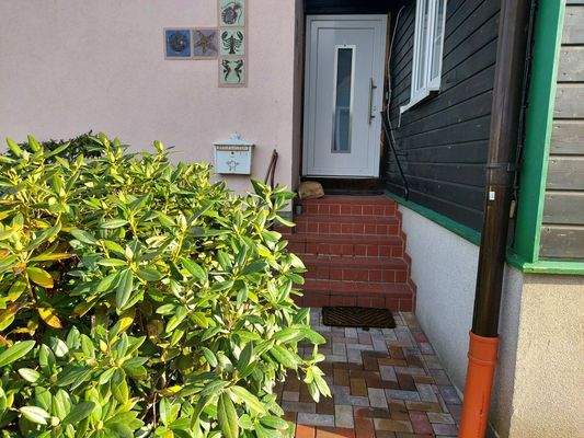 gepflasterter Eingangsbereich