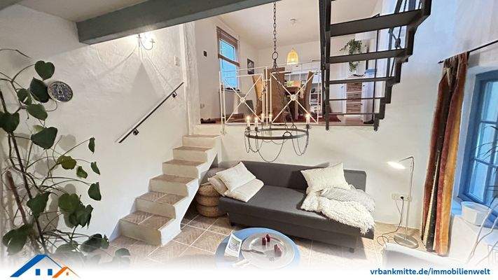 Blick vom Kaminzimmer ins Esszimmer