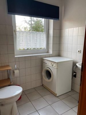 Duschbad mit Waschmaschine