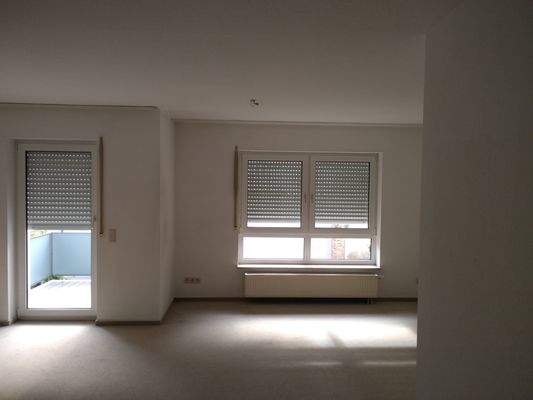 Wohnzimmer mit Balkon