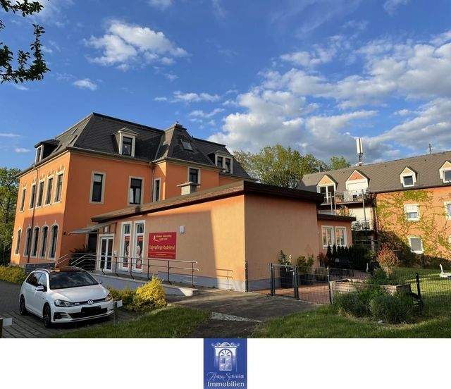Hübsche Wohnung mit großer Terrasse in grüner und ruhiger Lage! - Foto 4