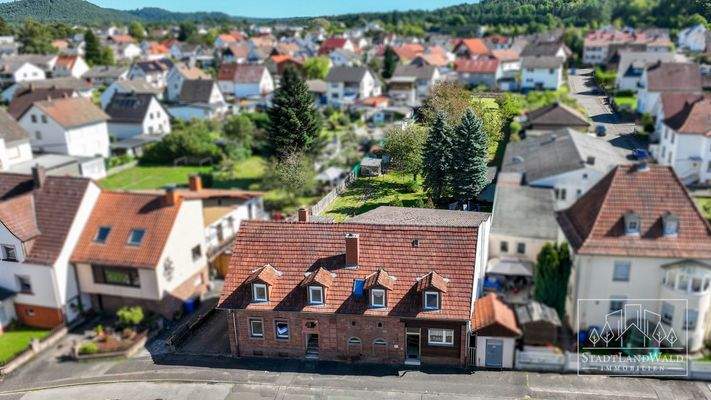 Luftbild Haus mit Garten und Bauplatz in Münchweiler