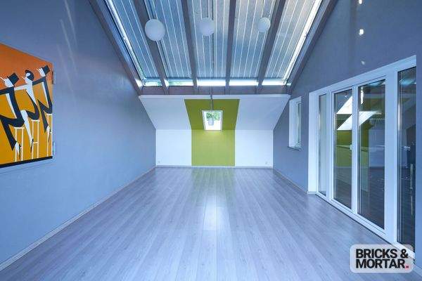 beheizbarer Wintergarten mit Markise