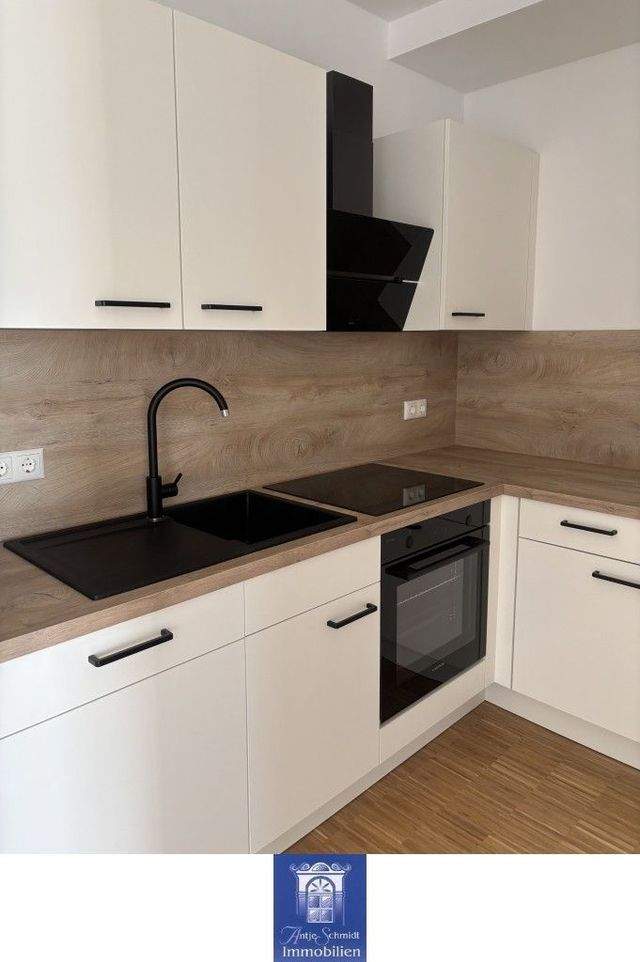 Gemütliche und hochwertige Neubauwohnung mit Balkon, EBK und Fußbodenheizung! - Foto 2