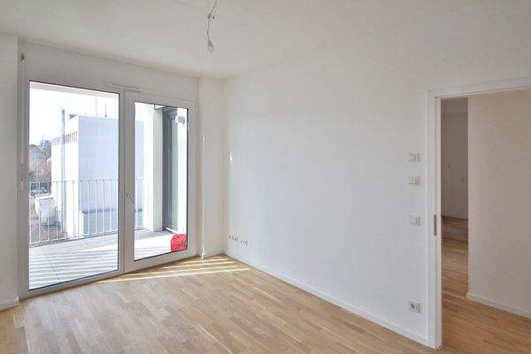 Schlafzimmer mit Balkonzugang