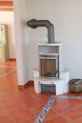 WE 1 Ofen im Wohnzimmer 