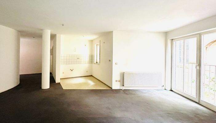 Wohn-/Ess-/Schlafzimmer mit offener Küche