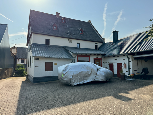 05 Rückseite Wohnhaus und Anbau.png