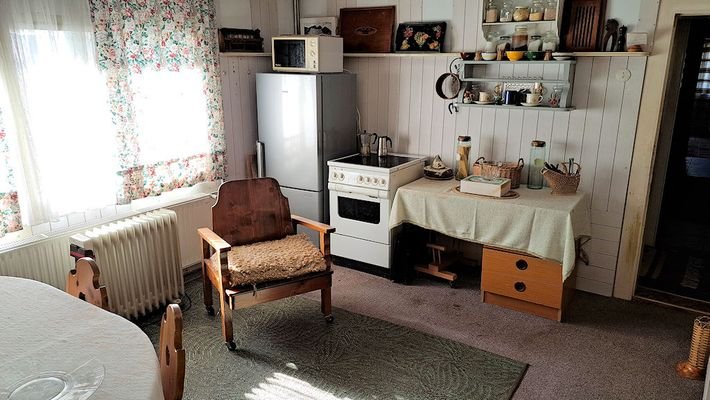 Wohnzimmer mit Kochnische im Erdgeschoss C.jpg