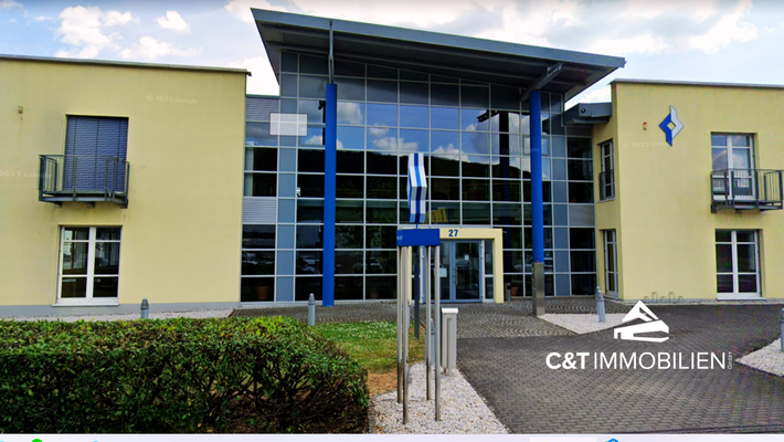 Außenansicht C&amp;T mit Logo.png