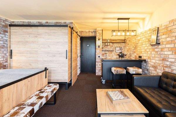 Wohnzimmer mit Küche