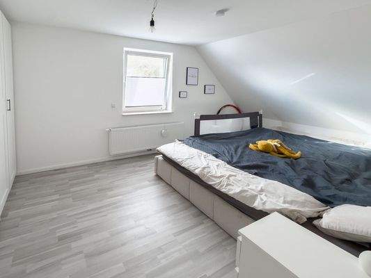 Ein weiteres Kinder-, Gäste- oder Arbeitszimmer im OG