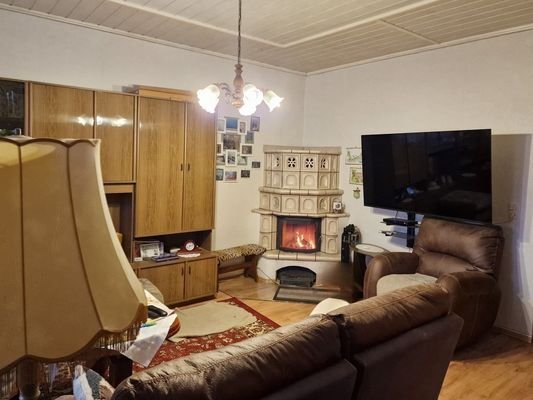 Wohnzimmer mit  Kamin - Wohnung Obergeschoss 