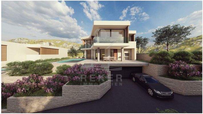 Blick über Primošten und das azurblaue Meer