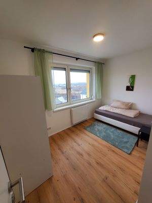 Schlafzimmer mit einem Bett