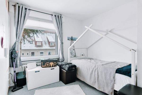 Schlafzimmer in der Obergeschosswohnung