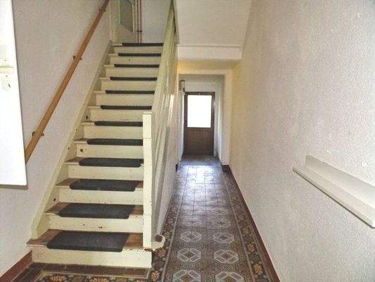 Foto-Flurbereich EG mit Treppe zum OG