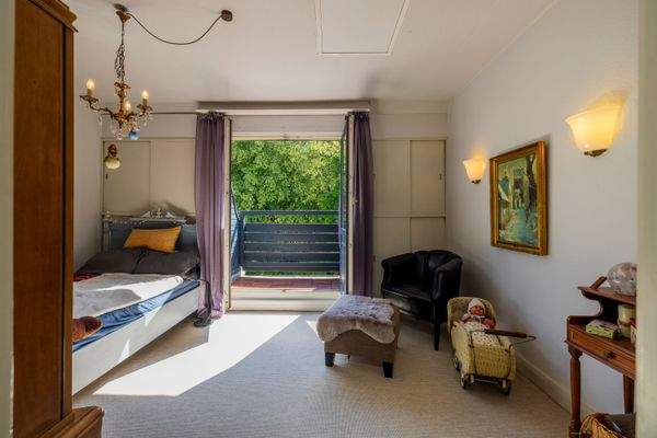 Gästezimmer im Dachgeschoss mit Balkon