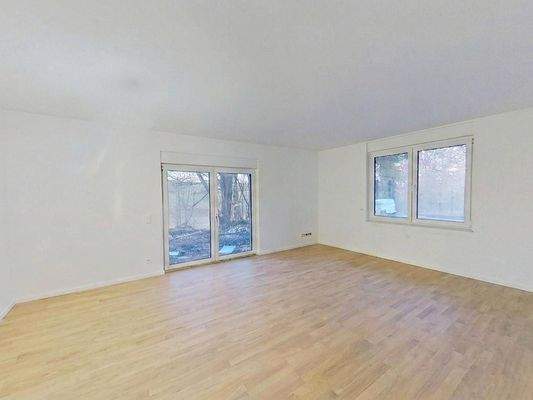 Ansicht I: Wohn- und Esszimmer mit offenem Küchenbereich