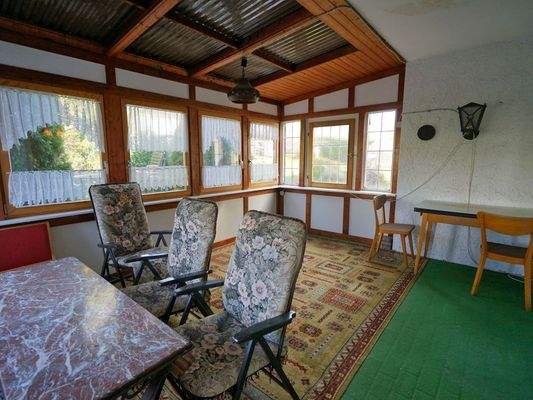 ...mit Zugang zum Wintergarten