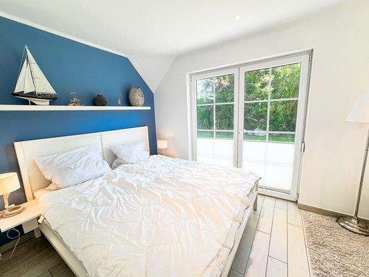 Eines der Schlafzimmer im EG