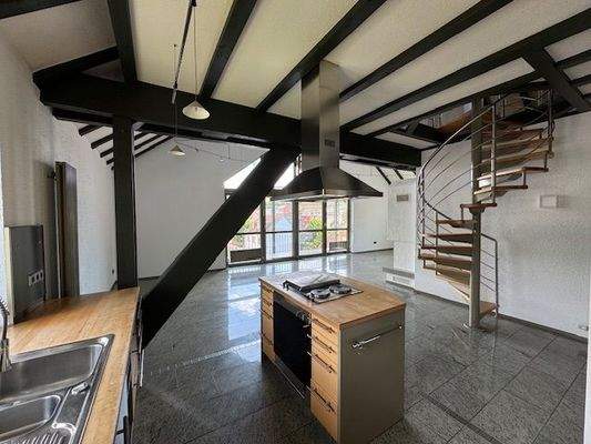 6 Blick von der Küche in den Wohnbereich