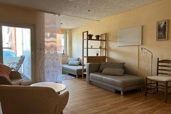 Wohnzimmer mit Schlafbereich